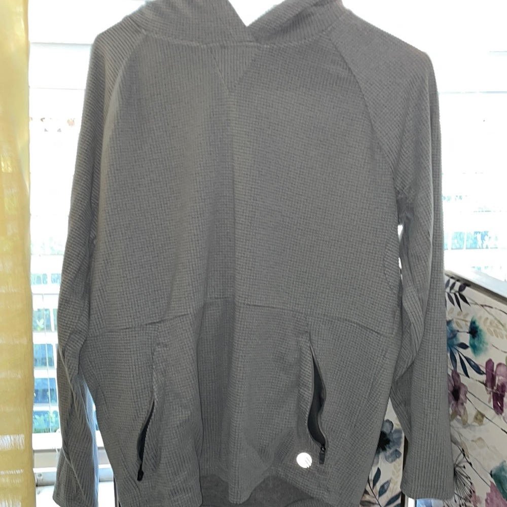 Microgrid fleece. Never worn very good condition and very cute outerwear option.